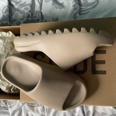 (Brand New) Authentic Yeezy Slides (Restocked) Color: Pure Size: (Us) 4y/4m (Fits Like A 5 Or 5.5 Women’s) New With Tags & Original Box Comes With Proof Of Authenticity Purchase W/Fendi Bag Or Dior Sneakers At Original Price And Get $125 Off ***No Offers-Price Is Firm*** Tan Yeezy Slides, Yeezy Slides Outfit Women, Yeezy Slides Pure, Adidas Yeezy Slides, Dhgate Finds, Adidas Shoes Yeezy, Yeezy Slides, Dior Sneakers, Fendi Bag