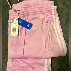 New With Tags! Adidas Track Pants With Zip At Ankle. Draw String Waist. 100% Polyester. Adidas Pants With Elastic Waistband For Spring, Adidas Cotton Sweatpants For Spring, Adidas Fitted Sweatpants For Spring, Pink Adidas Pants For Loungewear, Adidas Spring Pants With Pockets, Adidas Spring Bottoms With Pockets, Adidas Bottoms With Pockets For Spring, Adidas Pants For Spring, Adidas Pants With Pockets For Spring