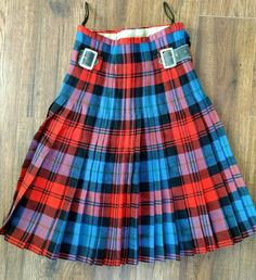 Vintage Red Plaid Wool Kilt  Brand: Thos. Gordon and Sons Highland Dress Manufacturers Made in Scotland Size Extra Small  I believe it may be youth sized. Might fit a very slim man or woman. This is very very small waisted! And very heavy and thick! Opened the whole width is about 36"/37". Closed the waist measures approximately 22" to 23" inches. Measurements are approximately: Waist 22" to 23" Length: 23.5" Please inspect all photos carefully for details as this kilt shows signs of wear and age. There are little holes and tears as shown in the photos. Kilt Skirt, Ditsy Floral Dress, Vintage Trucker Hats, Retro Accessories, Vintage Mens Fashion, Vintage Hippie, Hippie Outfits, Boho Festival, Wool Dress