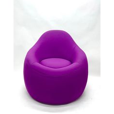 a purple chair sitting on top of a white floor