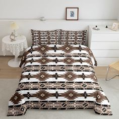 a bed with a brown and white pattern on it