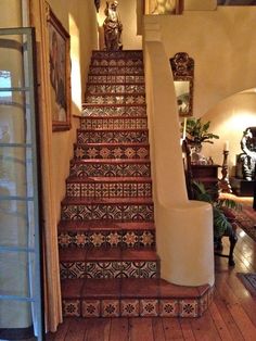 the stairs are decorated with decorative tiles