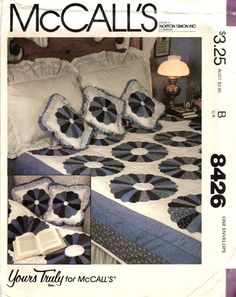 an advertisement for a quilter's book called mccall's, featuring blue and white bedspreads