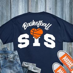 a t - shirt that says basketball sis with an orange heart on the front and bottom