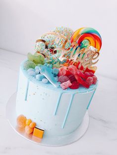 a birthday cake decorated with candy and candies