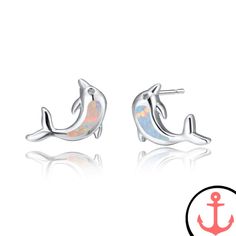 Dolphin Earrings Studs: Embrace the Mystical Charm of the Sea Indulge in the enchanting allure of the ocean with our Dolphin Earrings Studs. Lovingly crafted to capture the spirit of the sea, these exquisite earrings are the perfect accessory for passionate lovers of marine life. Whether you're a devoted sea explorer or simply drawn to the majestic beauty of dolphins, these studs are a must-have addition to your jewelry collection. Designed with a careful blend of opal and stainless steel, these Cute Dolphin, White Opal Earrings, Dolphin Earrings, Quirky Earrings, Fire And Stone, Stone Studs, Faux Stone, Opal Earrings, Small Earrings