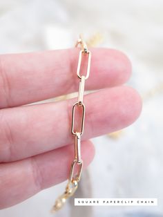 Details: - 18K Gold Filled Curb Cuban chain. Link size: approx. 5mm - 18K Gold Filled Rope Paperclip chain. Link size: approx. 10mm x 6mm - 18k Gold Filled Square Paperclip chain. Link size: approx. 10m x 4mm - 24K Yellow Gold Filled Round Link Chain. Link size: approx. 7mm - 100% hypoallergenic, Lead & Nickel Free. Product care: - You can shower with it however you should avoid saltwater/ swimming pool/ jacuzzi. - Avoid the jewelry coming into contact with perfume or lotions. - Store away i Gold Link Paperclip Bracelet As Gift, Gold Link Paperclip Chain Bracelet, Yellow Gold Chain Necklace With Solid Link Construction, Gold Plated Link Paperclip Bracelet With Adjustable Chain, Gold Paperclip Chain Bracelet Gift, Gold Paperclip Chain Bracelet With Adjustable Chain, Gold Link Chain Bracelet With Paperclip Design, Gold Link Chain Bracelet With Paperclip Style, Gold Minimalist Chain Necklace With Solid Link