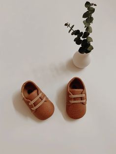 These adorable and soft little crib shoes are a must-have for boys or girls. They feature a soft rubber sole and functioning ties. Cute Leather Spring Booties, Cute Non-slip Leather Booties, Non-slip Leather Booties, Cute Leather Non-slip Booties, Cute Leather Booties With Non-slip Details, Spring Leather Booties With Soft Sole, Brown Lace-up Sneakers With Soft Sole, Brown Leather Sneakers With Soft Sole, Adjustable Booties With Soft Sole And Round Toe