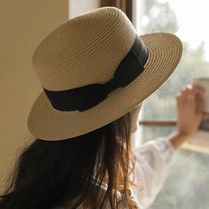 Stay cool and stylish with our classic straw boater hat. Crafted from high-quality, breathable straw, it features a wide brim for excellent sun protection and a chic black ribbon band. The lightweight design ensures comfort, making it perfect for garden parties, beach outings, and casual strolls. Elevate your look with this elegant and functional accessory. Size: M: 56-58cm & L: 58-60cmStyle: CasualBrim Style: Wide brimCrown Design: Round crownShape: FlatDesign Details: Bowknot Outdoor Soiree, Straw Boater Hat, Leather Beret, Beach Outing, Straw Boater, Knit Beret, Summer Straw Hat, Hat Beret, Summer Hats For Women