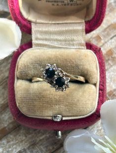 an engagement ring in a velvet box