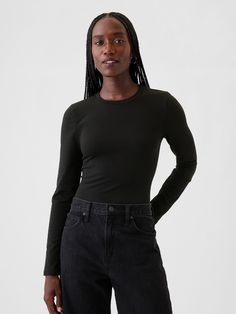 Soft, stretchy cotton-modal blend T-shirt bodysuit.  Crewneck.  Long sleeves.  Snaps at inseam.  Full coverage back.  Fit: Close to the body.  Models wearing Gap Dark Clothes, Shirt Bodysuit, Bodysuit Black, Black Bodysuit, Office Wear, The Body, Gap, Long Sleeves, Crew Neck