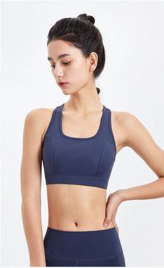 The Emes Shop sports bra is detailed with a round scoop neckline. thick bands. and elevated seaming. Features a triangular shaped mesh paneling in the back for both breathability and style. MATERIAL: 80% Nylon. 20% SpandexMEASUREMENTS: Small Bust: 24.8" in Length: 11.8"in Medium Bust: 26.4" in Length: 12.2"in Large Bust: 28" in Length: 12.6"in X-Large Bust: 28.3" in Length: 13"in Scoop Neck Sports Bra With Built-in Bra For Training, Sports Bra With Built-in Padding And Scoop Neck, Sporty Sports Bra For Light Exercise With Wide Straps, Sporty Sports Bra With Wide Straps For Light Exercise, Medium Support Sports Bra With Wide Straps For Training, Functional Sports Bra With Wide Straps For Training, Scoop Neck Sports Bra With Built-in Padding For Yoga, Scoop Neck Sports Bra With Built-in Padding, Sporty Yoga Sports Bra With Wide Straps