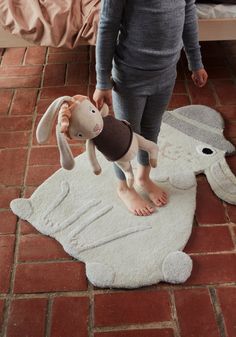 Hopsi Rabbit is a fun and playful rug for your child's bedroom. Made in a tufted quality using wool and cotton. The rug is designed with 3D effects, providing a fun and living expression. Product Overview Available Colors: Offwhite Material: 80% Wool - 20% Cotton Dimensions: 29.92"W x 39.37"H Children's Rugs, Rabbit Rug, Baby Bouncer, Bunny Designs, Plush Rug, Neutral Nursery, Big Gifts, Woodland Nursery, Hamsters