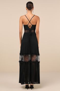 Everyone will be in awe of your aesthetic when you stroll in wearing the Lulus Deeply Stunning Black Lace Pleated Lace-Up Backless Maxi Dress! Lightweight woven fabric shapes this dramatic dress with slender spaghetti straps that lace up the open back, supporting a fitted bodice with a V-neckline and flattering ruching. Sheer lace panels lend a cutout effect to the bodice, atop a tiered skirt with airy pleats, lacy ruffles, and matching sheer panels throughout. Maxi hem completes the look. Hidde Black Sheer Maxi Dress, Elegant Sheer Backless Evening Dress, Luxury Fitted Dress With Sheer Back, Elegant Maxi Dress With Boned Bodice For Cocktail, Elegant Sheer Backless Maxi Dress, Luxury Sheer Back Evening Dress, Chic Floor-length Dress With Sheer Bodice, Luxury Pleated Evening Dress For Party, Sheer Bodice Backless Maxi Dress For Evening