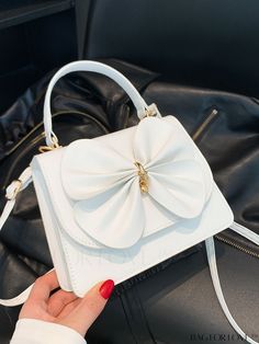 BagForLove - Chic Crossbody Handbag with Butterfly Bow Decoration for Trendy Fashionistas Product Description Color White Type Square Bag Bag Size Mini Pattern Type Plain Coating 100% Polyurethane Composition 100% Polyurethane Material PU Leather Size Chart INCH CM Strap Length Bag Length Bag Width Bag Height Handle Height 44.1 inch 7.9 inch 2.8 inch 5.9 inch 3.9 inch Strap Length Bag Length Bag Width Bag Height Handle Height 112 cm 20 cm 7 cm 15 cm 10 cm Details Pictures Similar Products h2 { text-align: center; } /* æ¢è¡ */ li{ white-space: normal; word-break: break-all; word-wrap: break-word; } .red-box { width: 100%; display: flex; flex-direction: row; flex-wrap: wrap; justify-content: center; } .red-box > div { width: 190px; height: 250px; margin: 10px; } .red-box > div > a > img { White Double Handle Satchel As Gift, White Box Bag As Gift, White Shoulder Bag With Detachable Handle As Gift, White Box Bag With Mobile Phone Holder For Evening, White Satchel Evening Bag, Chic White Handheld Bag, White Satchel With Detachable Strap As Gift, Trendy White Satchel For Gift, Trendy White Satchel As A Gift