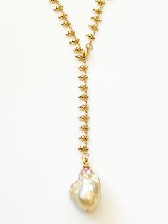 Peach Japanese Keshi Pearl Necklace on Gold Ball Charm Chain by Sage Machado - The Sage Lifestyle Ceremonial Gold Pearl Chain Jewelry, Spiritual Pendant Necklace With Pearl Chain, Peach Pearl Necklace, Gold-tone Pearl Necklace With Adjustable Chain, 14k Yellow Gold-filled Pearl Necklace With Adjustable Chain, Keshi Pearl Necklace, Keshi Pearls, Necklace Designs, Chain Lengths