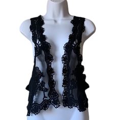 Nella Fantasia Vivo Crochet Lace Vest Sleeveless Black Nwt Medium Smoke/Pet Free Home * Reasonable Offers Considered * Black Lace Top For Layering, Black Lace V-neck Tank Top, Lace Party Vest Tank Top, Lace Party Tank Top, Black Lace Tank Top With Lace Details, Black Lace Patchwork Cami Top, Black Cami Top With Lace Patchwork, Sleeveless Crochet Lace Party Top, Fitted Sleeveless Crochet Top With Lace Patchwork