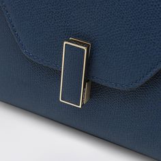 Micro shoulder bag by Valextra in sapphire blue calfskin nude-coloured, featuring a top handle, a removable and adjustable shoulder strap, a gold-tone metal clasp, a single compartment and an internal flat pocket. Composition: 100% Calf leather Blue Flap Bag With Removable Pouch For Formal Occasions, Blue Formal Flap Bag With Removable Pouch, Formal Blue Flap Bag With Removable Pouch, Blue Rectangular Flap Bag For Formal Occasions, Blue Luxury Flap Bag For Formal Occasions, Luxury Blue Flap Bag For Formal Occasions, Formal Blue Rectangular Flap Bag, Classic Blue Formal Flap Bag, Luxury Blue Flap Bag With Gold-tone Hardware