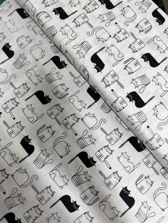 a black and white cat print fabric