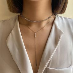 Style effortlessly with this unique layered duo. Consisting of two necklaces, mix and match with our patented design. Chain Italian chain, width 5mm Adjustable chain: 14-17in (35-43cm) Bar Lariat Necklace Drop Height 4.4in (11.2cm) Adjustable chain: 15-17in (38-43cm) .925 Sterling Silver Cubic Zirconia Hypoallergenic, lead and nickel free #034S-350S Italian Chain, Two Necklaces, Gold Chain Choker, Layered Choker Necklace, Layered Necklace Set, Multi Strand Necklace, Lariat Necklace, Chain Choker, Strand Necklace