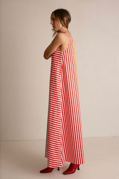 A line, maxi length dress with a simple scoop neck in a bold, colorblock stripe print. Gathers at the waist with a matching tie belt. Fabric is 100% cotton. Ella is 6' tall, 35" bust, 26" waist, 36" hip, and is wearing a size 2. October Fashion, Pottery Patterns, Spring Chicken, Bright Fabrics, Style Muse, Feminine Women, Style And Grace, Colorblock Dress, Fine Fabric