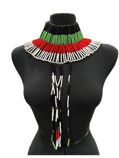 Meticulously hand beaded in Kenya. This premium Nefertiti Necklace is handmade with high-quality Kenyan beads, exuding luxury and elegance. The adjustable closure makes it easy to fit any size neck, while the intricate beading techniques immortalize the dazzling beauty of the Egyptian Queen. Add a dramatic pop of color to any outfit with one of our most unique beaded jewelry pieces yet! Nefertiti Necklace, Unique Beaded Jewelry, Intricate Beading, The Dazzling, Egyptian Queen, Beading Techniques, Hand Beading, Kenya, Jewelry Pieces