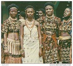 an old photo of african women in traditional dress