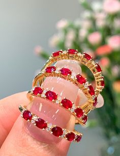 Model Number: RRE1PGX103 18K Gold Ruby Ring Available: Yellow and White Gold Metal Stamp: 18k Au750 Metals Type: 18K Gold Weight/g: 1.83 Stone: Material Rubyd/5pc and Weight/ct 0.61 Side Stone: Diamond and Weight/ct 0.06 Metal Color: Yellow Gold Setting Type: Prong Setting Gender: Unisex Fine Luxury Ruby Stackable Rings Fine Jewelry, Luxury Gold Stackable Ruby Rings, Luxury Stackable Ruby Ring For Women, Luxury Red Stackable Rings Fine Jewelry, Luxury Yellow Gold Stackable Ruby Ring, Luxury Stackable Ruby Ring In Fine Jewelry Style, Luxury Stackable Women's Ruby Ring, Luxury Fine Jewelry Ruby Stackable Rings, Gold Ruby Ring