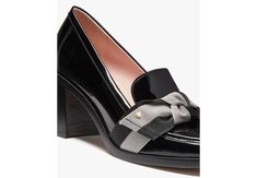 We turned our Leandra loafers into a leg-lengthening pair of pumps. Trimmed with twill bows these lustrous patent leather style will speak to your excellent taste. | Kate Spade Leandra Heeled Loafer, Black - 8.5 Elegant Patent Leather Loafers For Office, Luxury Kate Spade Heels For Formal Occasions, Chic Patent Leather Loafers, Chic Patent Leather Loafers For Workwear, Chic Patent Leather Workwear Loafers, Elegant Patent Leather Loafers For Work, Chic Formal Patent Leather Loafers, Kate Spade Pointed Toe Heels For Work, Chic Evening Patent Leather Loafers