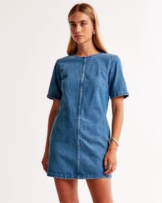 Easy-fitting short-sleeve mini dress in our classic denim fabric and shift silhouette, featuring on-trend seaming detail and crew neckline.