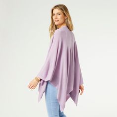 Add a layer of warmth and style to any outfit with our Kiara Lightweight Wrap. The open-style front makes it easy to toss over your top or dress. This one size fits most wrap can be worn all year-round. Perfect for work, home, or travel. Pair with our Embrace Fashion Fasteners to create a unique look. Materials: Acrylic. Purple Open Front Winter Outerwear, Versatile Open Front Winter Tops, One Size Open Front Outerwear For Layering, Spring Purple Outerwear For Layering, Spring Layering Cape, Purple Outerwear For Spring Layering, Spring Solid Color Long Sleeve Poncho, Winter Wrap Outerwear For Daywear, Versatile Wrap Outerwear For Layering