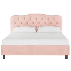 a pink bed with white sheets and pillows on it's headboard, in front of a white background