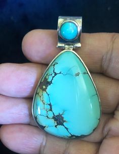 This pendant is made in Nepal and pure silver. Turquoise is from Tibet. Traditionally, Tibetan wear turquoise, corals, amber and Dzi beads for healing and protections as well as jewelry for special occasions like weddings and New Years. We also wear one or two pieces of jewel for every day have good health and good luck.  Size of the pendant is 2.2 inches height and 1.3 inches width. Tibetan Turquoise, Good Health, Turquoise Pendant, Nouvel An, Silver Turquoise, Tibet, Pure Silver, Nepal, Pendant Necklaces