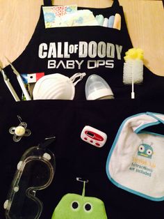 an apron that has various items inside of it, including toothbrushes and bibs