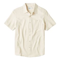 Cut and sewn from soft, loose-weave cotton Beige Button-up Shirt For Casual Gatherings, Cotton Top With Rolled Sleeves And Camp Collar, Beige Cotton Top With Placket, Beige Relaxed Fit Shirt For Casual Gatherings, Beige Cotton Short Sleeve Shirt With Pockets, Classic Beige Cotton Short Sleeve Shirt, Casual Cotton Shirt With Rolled Sleeves, Casual Unstructured Tops With Rolled Sleeves, Relaxed Fit Beige Cotton Shirt