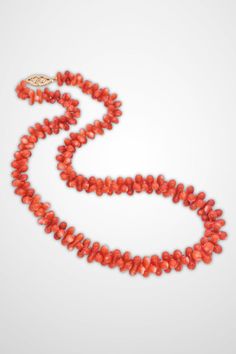 Discover timeless elegance with this Vintage 14K Yellow Gold Red Coral Beaded Necklace. The vibrant red coral beads are beautifully accented by the rich yellow gold, creating a piece that’s both classic and eye-catching. Perfect for adding a touch of sophistication to any outfit. #VintageJewelry #RedCoral #14KGold Red Briolette Necklace For Formal Occasions, Classic Coral Jewelry As Gift, Classic Coral Jewelry Gift, Classic Red Beaded Jewelry, Classic Red Jewelry With Round Beads, Classic Red Jewelry With Polished Beads, Red Polished Beads Jewelry For Formal Occasions, Formal Red Jewelry With Polished Beads, Formal Red Polished Beaded Jewelry