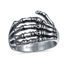 a skeleton hand ring with the words stainless steel on it