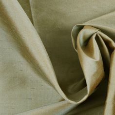 A beautiful and soft silk shantung/ dupioni; lightweight. Rely on this fabric for special occasion garments, as a lining for bags, and for home decor applications. Wedding Silk Fabric With Satin Finish, Elegant Silk Fabric For Spring, Festive Cream Elegant Fabric, Elegant Green Fabric For Festive Occasions, Elegant Green Festive Fabric, Elegant Silk Fabric With Satin Finish, Elegant Raw Silk Fabric For Wedding, Elegant Tussar Silk Fabric For Wedding, Elegant Tussar Silk Wedding Fabric