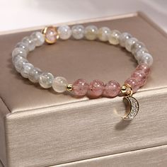 Be grateful for all the good things in life and truly enjoy every moment. Use this "Moon • Strawberry Crystal Grey Moonstone Bracelet" to remind yourself how lucky you are, and never forget to acknowledge and appreciate the simplicity and beauty of everyday life.

Natural strawberry crystal,Gray moonstone
Bead diameter: 4 mm
Premium zinc alloy
Elastic - Suitable for hand circumference: 14-18 CM
Hypoallergenic, lead & nickel free


*We carefully select each gemstone to offer gems with the best qu Moonstone Bracelet Ideas, Cute Crystal Bracelets, Moonstone Crystal Bracelet, Crystals Beaded Bracelets, Crystal Bracelet Design, Necklace Bracelet, Moon Stone Bracelet, Elegant Gemstone Bracelet, Beaded Bracelets Crystal