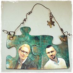 two men are depicted on a piece of wood that has been made into a puzzle