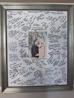 a couple's wedding pictures are framed in a frame with handwritten words on it