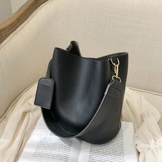 Brand Name: MR.YLLSShape: BucketHandbags Type: Shoulder BagsTypes of bags: Shoulder HandbagsOrigin: CN(Origin)Main Material: PUClosure Type: HaspHardness: SOFTExterior: NONEStyle: CasualModel Number: ZZ867Occasion: VersatileGender: WOMENPattern Type: SolidNumber of Handles/Straps: SingleInterior: Interior Zipper PocketInterior: No PocketDecoration: TasselItem Type: Handbagscolor: black,brown,khiki,greenstyle: fashion,lady,casual,luxurygender: females,feminine,woman,women,girls,lady,ladiesoccasio Women Crossbody Bag, Women's Handbags, Black Cross Body Bag, Womens Tote, Wide Straps, Casual Bags, Fashion Handbags, Look Fashion, Large Bags