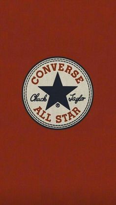 the converse all star logo on a red shirt