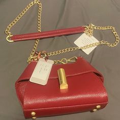 Brand New, Tags And Original Packaging. Red Shoulder Bag With Metal Hardware For Evening, Evening Red Shoulder Bag With Metal Hardware, Red Evening Shoulder Bag With Metal Hardware, Formal Red Shoulder Bag With Metal Hardware, Red Satchel With Gold-tone Hardware Modern Style, Modern Red Satchel With Gold-tone Hardware, Red Luxury Bags With Metal Hardware, Luxury Red Bag With Metal Hardware, Luxury Red Bags With Metal Hardware