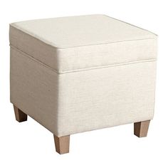 the footstool is made from wood and has a white upholstered cover