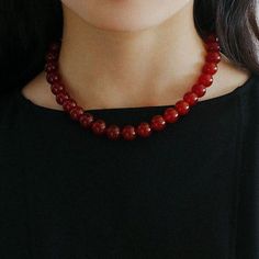 Product Details Material: 18K gold plated / red agate (12-12.5mm) Size: The inner circumference of the necklace is 41-47cm Weight: about 80.7g Note：Each natural stone possesses its own distinct color and texture, which may result in subtle variations. Description: "Captivating Red Agate Necklace - Irresistibly Alluring!" Indulge in the allure of our meticulously crafted 12mm Red Agate beads. With a size that perfectly complements any wearer, this necklace is impossible to resist. Each agate bead Red Statement Necklace, Beaded Necklace Red, Red Bead Necklace, Bead Necklace Designs, Red Necklaces, Red Agate Necklace, Red Beaded Necklaces, Round Bead Necklace, Colorful Necklace