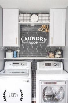 a washer and dryer in a laundry room with the words laundry room above them