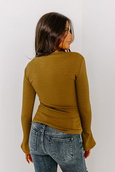 - Give your OOTD a touch of trendy flair with this cutie! - Unlined tight knit material with a ribbed texture - A round neckline - Long bell sleeves - A figure flattering silhouette that ends in a straight hemline Solid Ribbed Stretch Long Sleeve Top, Spring Crew Neck Long Sleeve Top, Ribbed High Stretch Scoop Neck Top, Stretch Ribbed Knit Top With V-neck, Stretch Long Sleeve Top With Ribbed Cuffs, Stretch Ribbed Long Sleeve Top For Layering, High Stretch Ribbed Scoop Neck Top, Stretch Knit Top In Solid Color, Winter Ribbed Stretch Tops