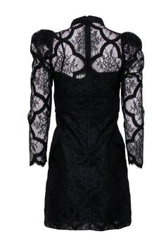 Go lush in lace with this Sandro frock! The iconic LBD is given a romantic upgrade with a delicate floral lace and embroidered design and precious puff sleeves. The perfect little statement piece for your next cocktail party. Add some glitz with shiny heels and statement earrings and you'll be looking tres chic! Size 4 (FR 36) Shell: 59% Nylon, 41% Polyester Trim: 100% Silk Skirt lining: 100% Cotton Top lining: 100% Polyester Concealed back zipper Lined Sheath silhouette High neckline w/ collar Evening Lace Dress With Lace Cuffs, Black Lace Dress With Lace Cuffs For Evening, Black Lace Dress With Lace Cuffs, Fitted Lace Dress With Lace Cuffs For Evening, Fitted Evening Lace Dress With Lace Cuffs, Shiny Heels, French Girl Chic, Skirt Lining, Sabrina Spellman