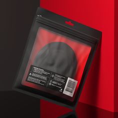 the packaging is designed to look like it has been wrapped in plastic and features a red background